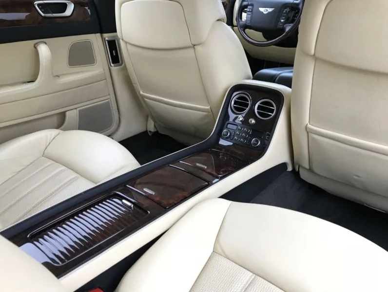 Light leather interior of a Bentley Flying Spur